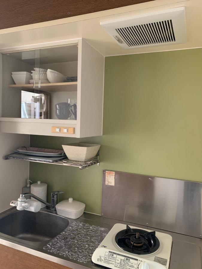 Ferienwohnung ウィンベル沖縄名護コーラルビュー Agarii Exterior foto